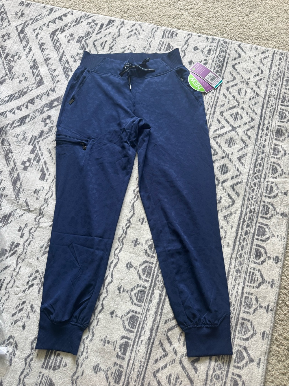 Healing Hands Trinity leopard print navy blue jogger scrubs pants.